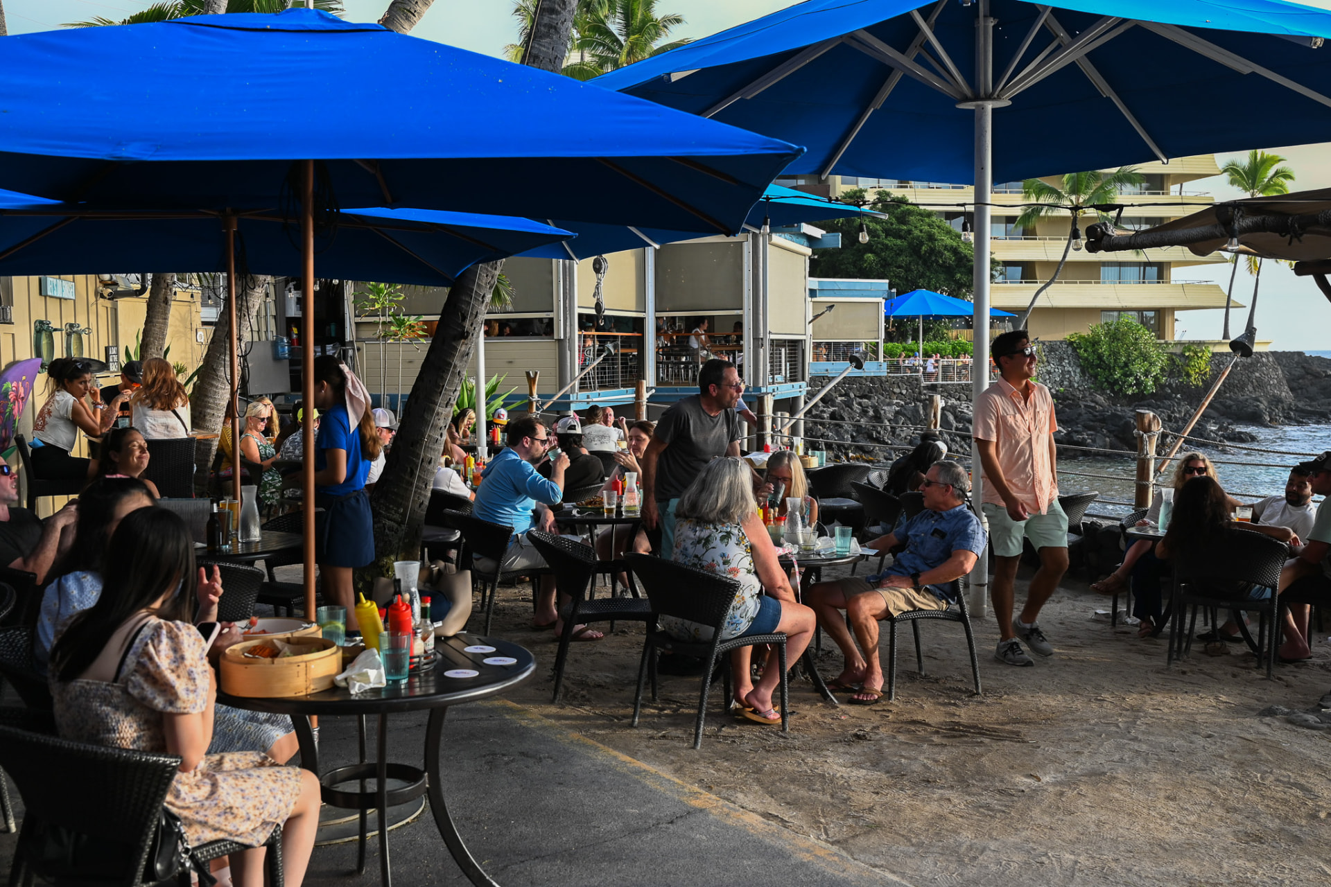 Guests gathered around the beachside bar